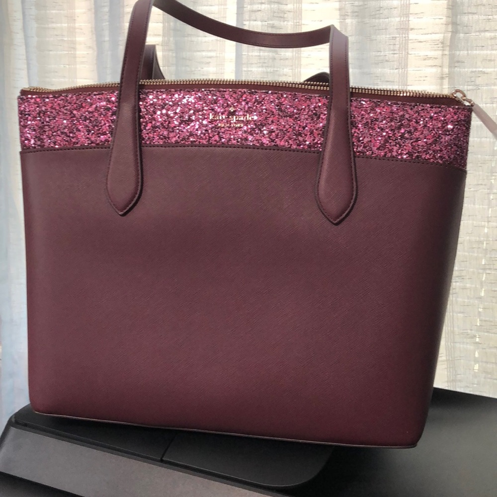 A Kate Spade pocketbook new with tags